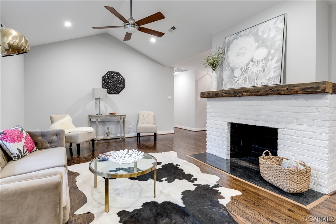4549 Arrowhead Road Richmond, VA 23235 - Photo 7 of 16 a living room with furniture and a fireplace