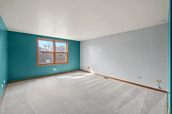 an empty room with front door
