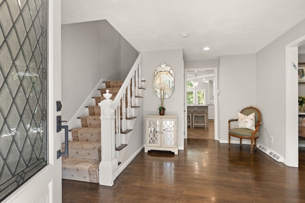 24 Queens Circle Sharon, MA 02067 - Photo 2 of 41 a view of an entryway with wooden floor