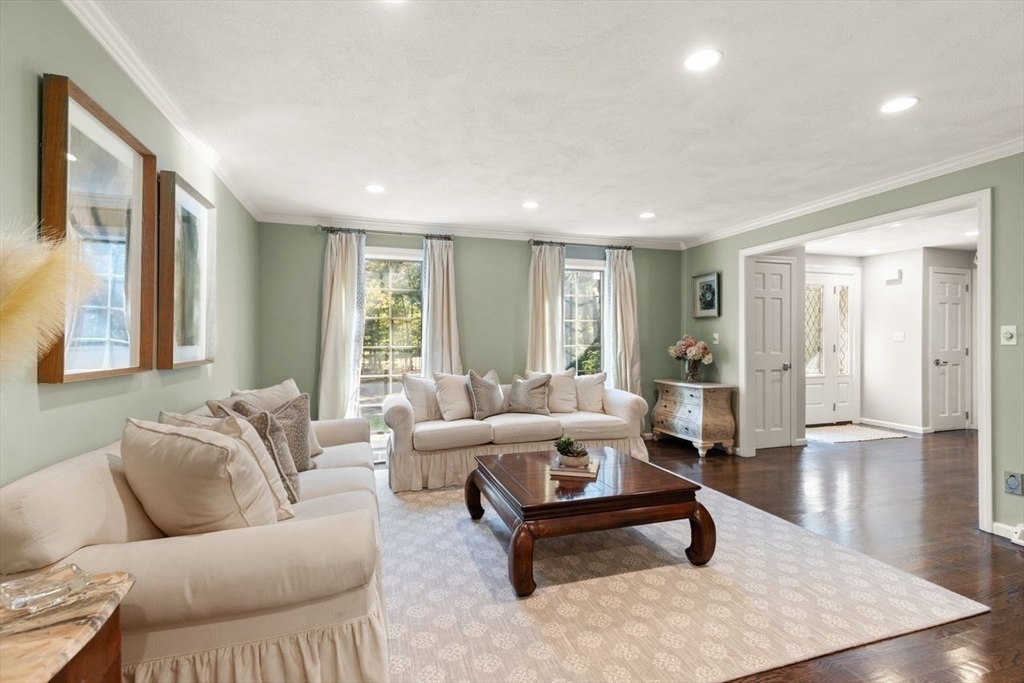24 Queens Circle Sharon, MA 02067 - Photo 3 of 41 a living room with furniture and wooden floor