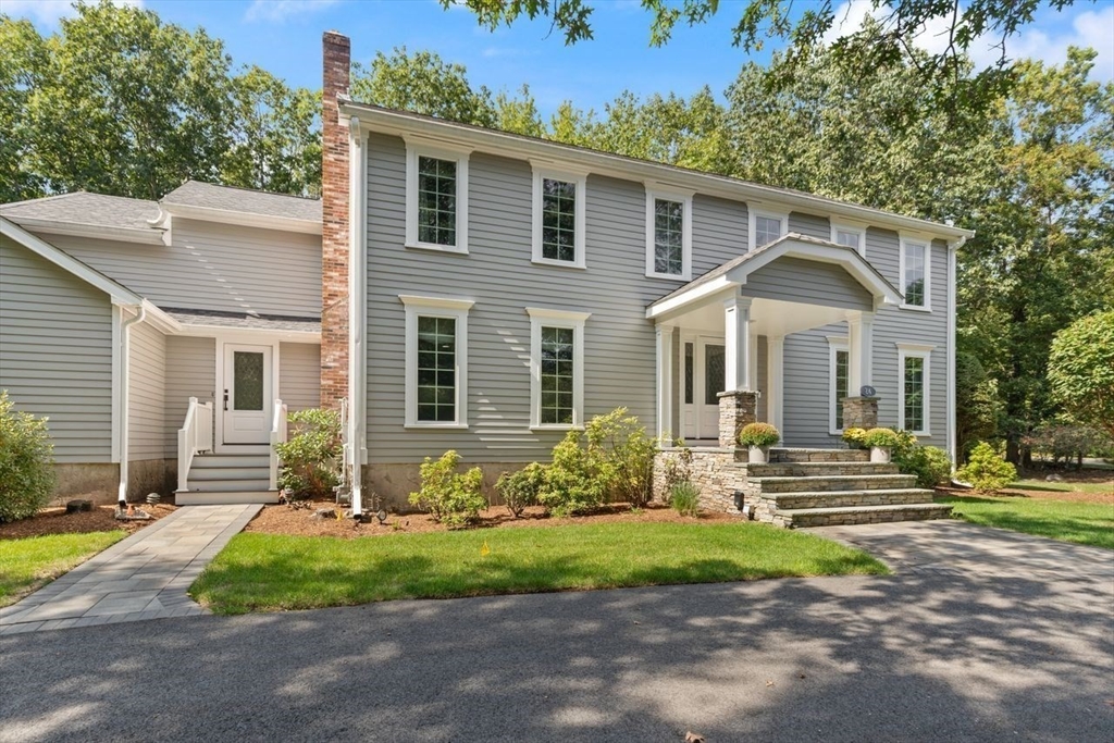 24 Queens Circle Sharon, MA 02067 - Photo 38 of 41 a front view of a house with garden