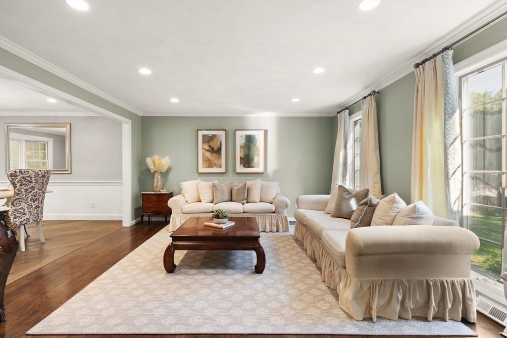 24 Queens Circle Sharon, MA 02067 - Photo 4 of 41 a living room with furniture and a large window