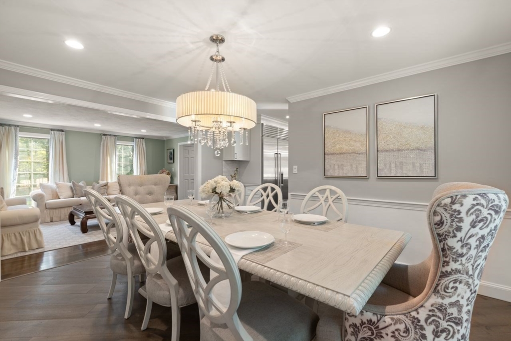 24 Queens Circle Sharon, MA 02067 - Photo 8 of 41 a view of a dining room and livingroom view
