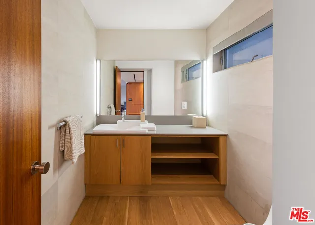 a view of a living room and wooden floor
