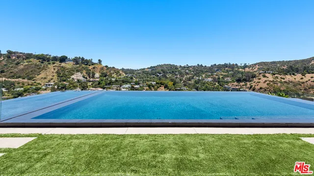 a view of a terrace with sitting area