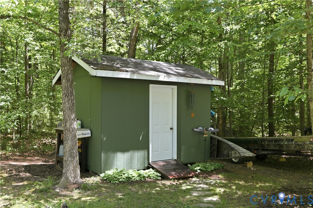 1570 Rock Castle Road Goochland, VA 23063 - Photo 42 of 53 Green shed with white trim and a white door, featu