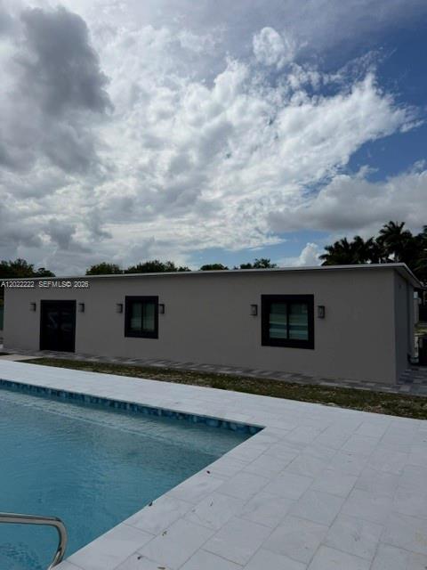 20465 Southwest 200th Street Miami, FL 33187 - Photo 12 of 36 a view of a house with a yard