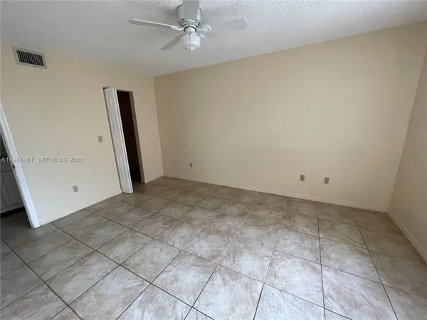 a view of a room with a fireplace