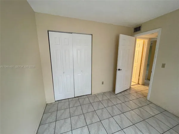 a view of a livingroom with an entryway