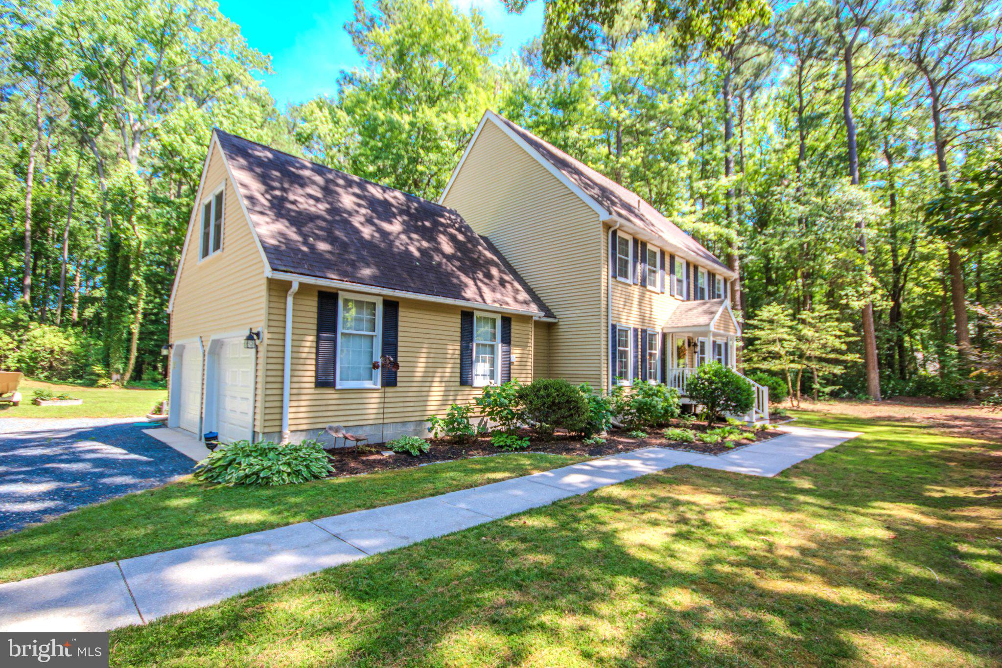 7301 Topaz Court Hebron, MD 21830 - Photo 2 of 47 Charming home nestled in lush greenery.