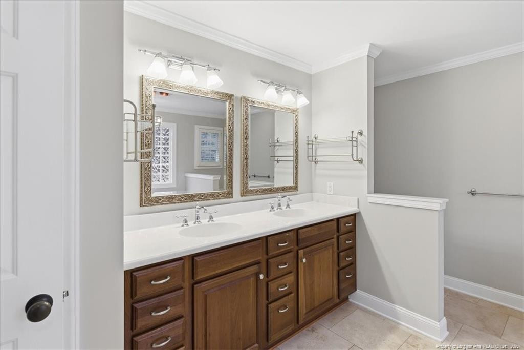 575 South Valley Road Southern Pines, NC 28387 - Photo 22 of 48 a bathroom with a granite countertop sink mirror and double