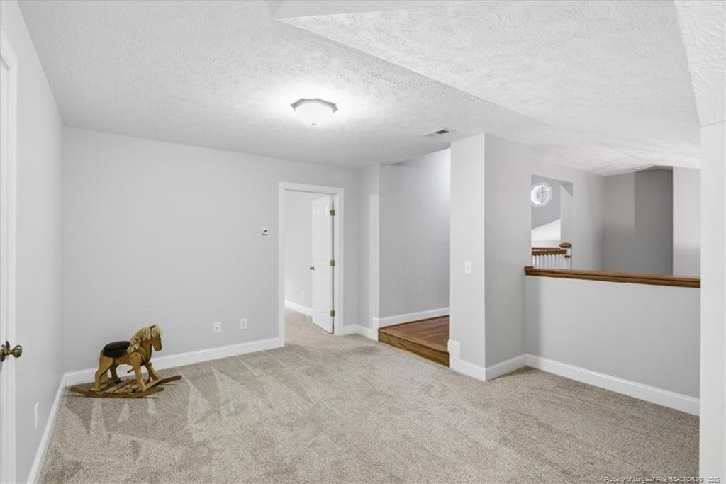 575 South Valley Road Southern Pines, NC 28387 - Photo 34 of 48 a view of room with hardwood floor and a ceiling fan