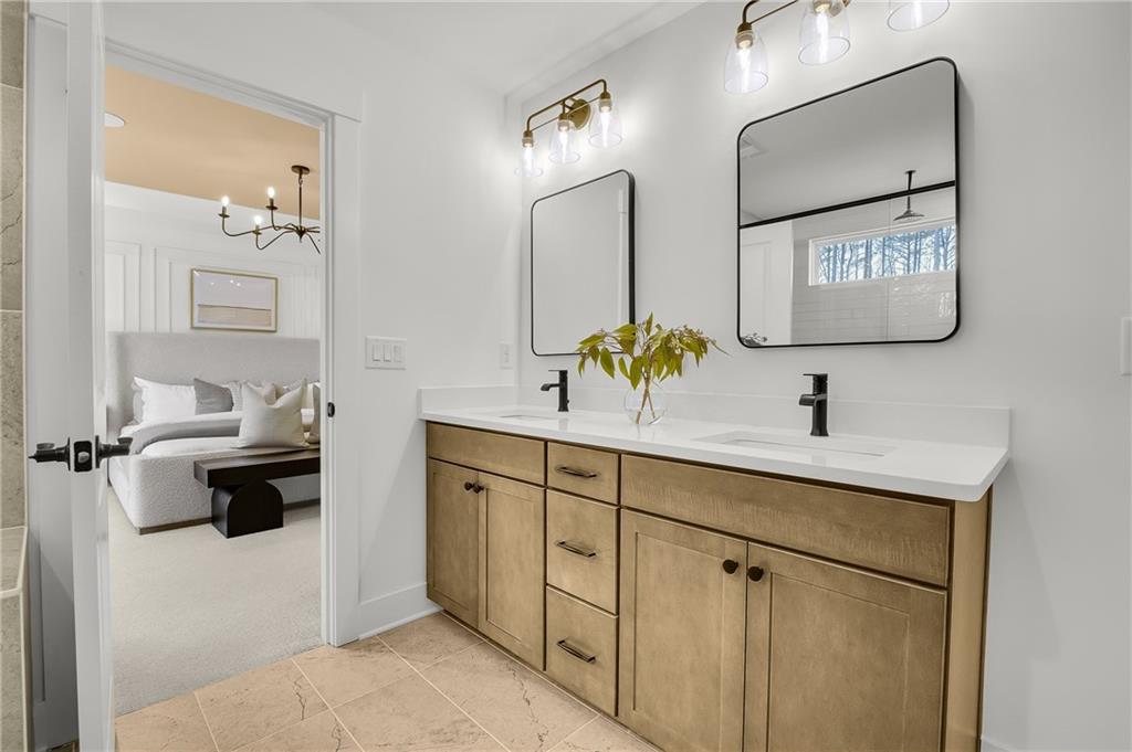 251 Rockledge Bend Powder Springs, GA 30127 - Photo 12 of 23 a bathroom with a sink and a mirror