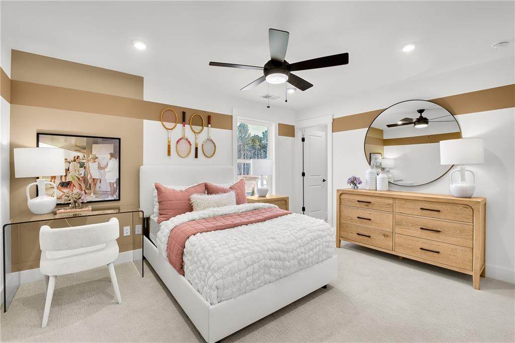 251 Rockledge Bend Powder Springs, GA 30127 - Photo 15 of 23 a bedroom with a bed and cabinets