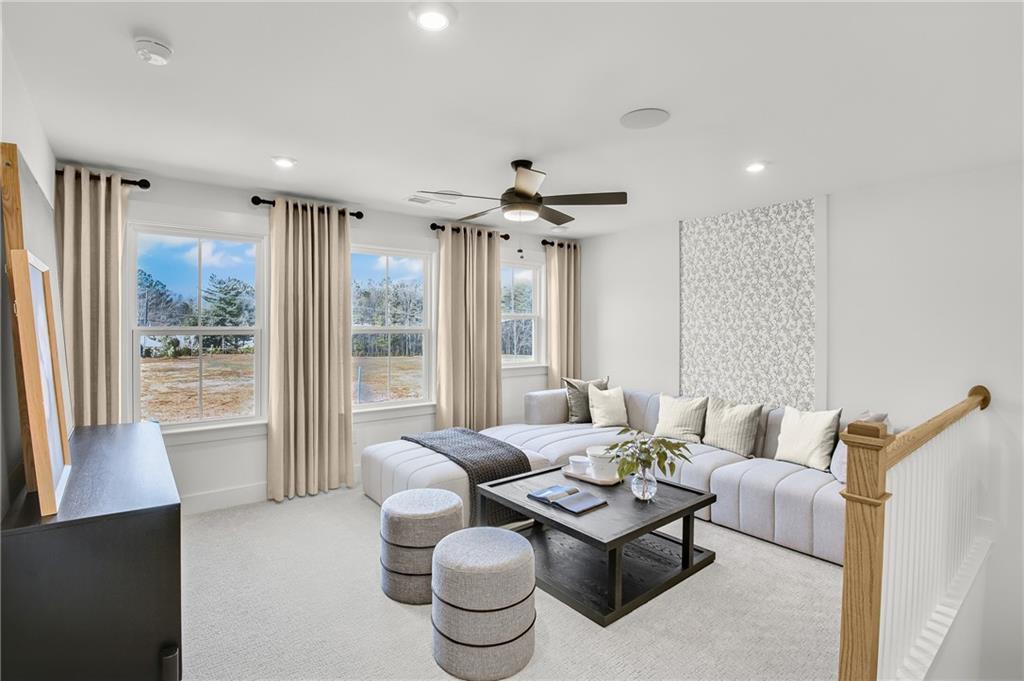 251 Rockledge Bend Powder Springs, GA 30127 - Photo 10 of 23 a living room with furniture and a large window
