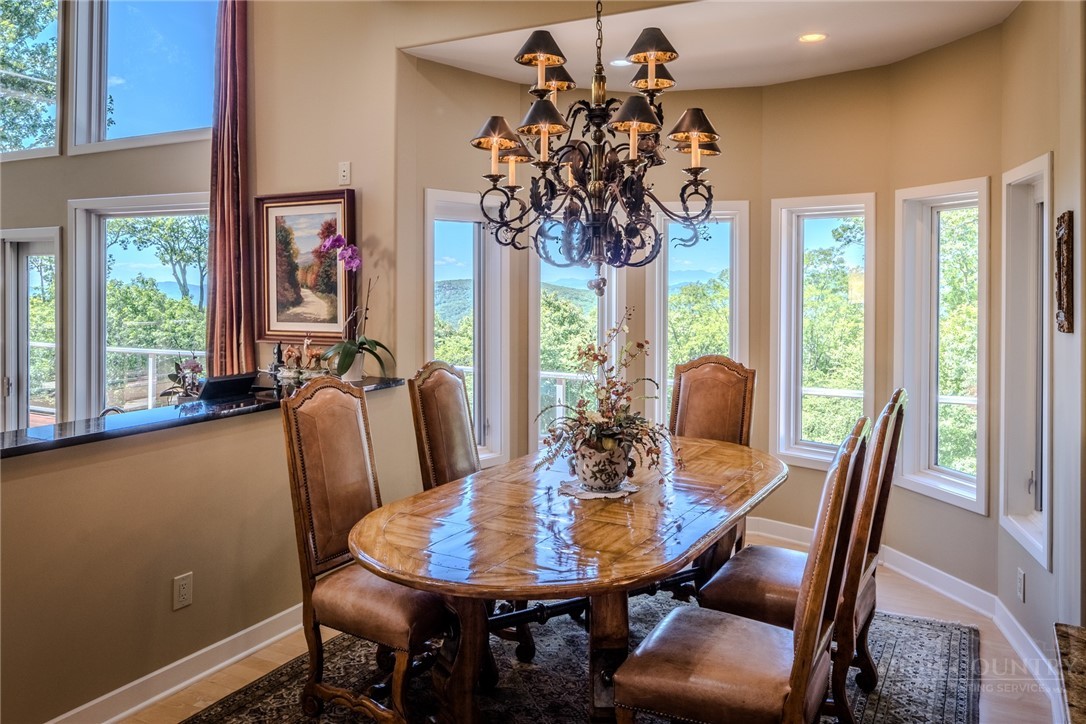 331 Branch Water Run Linville, NC 28646 - Photo 15 of 50 a view of a dining room with furniture window and outside view