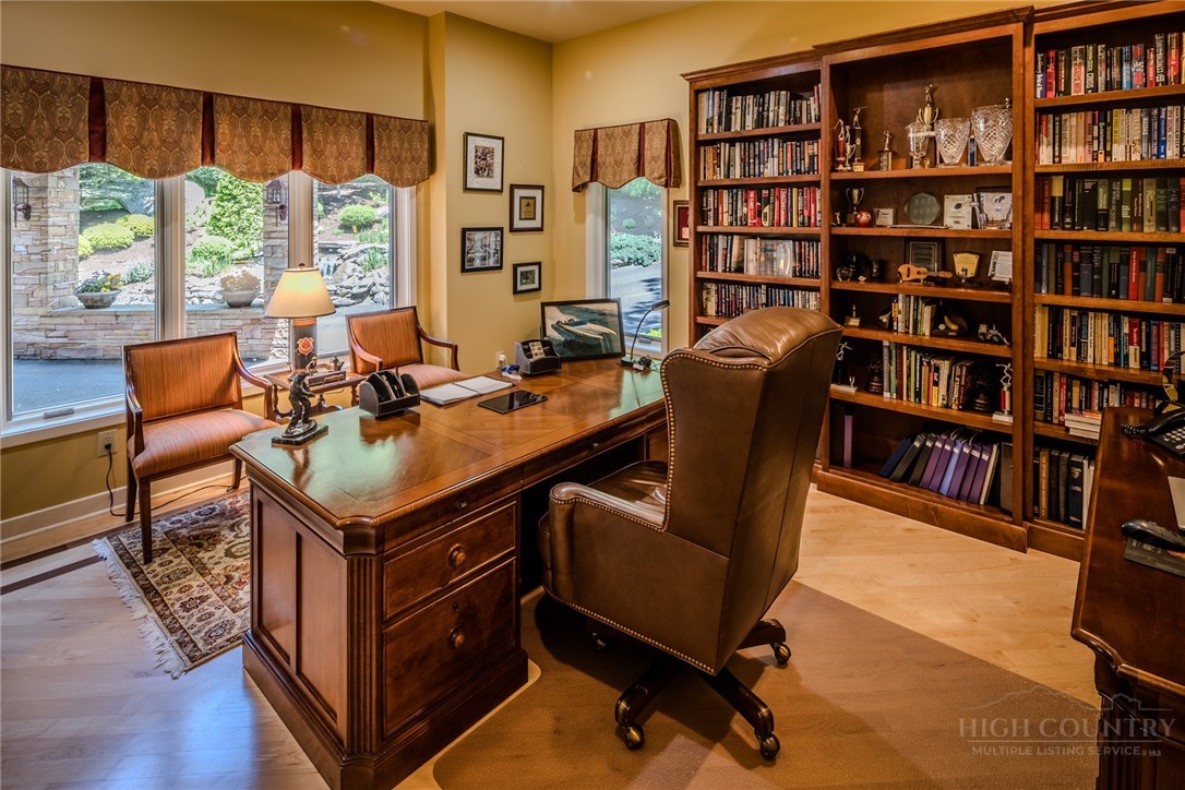 331 Branch Water Run Linville, NC 28646 - Photo 22 of 50 a living room with furniture and a book shelf