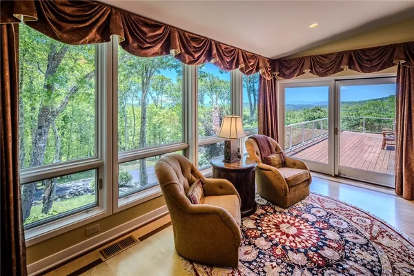 a large spacious bathroom with a granite countertop tub a mirror and a shower