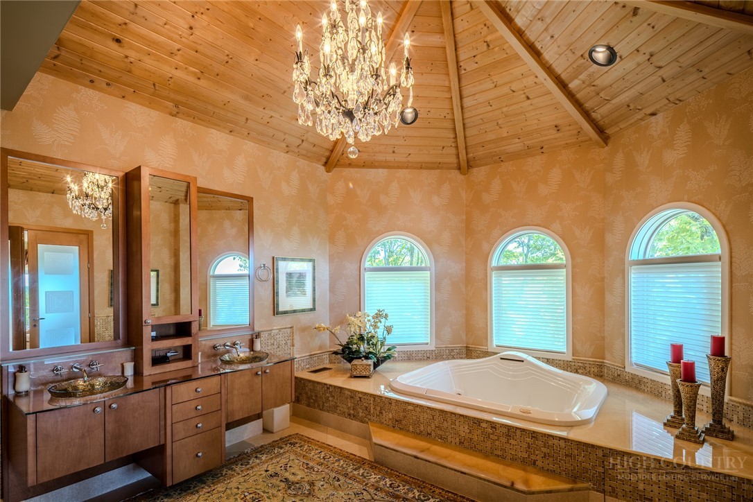 331 Branch Water Run Linville, NC 28646 - Photo 27 of 50 a large bedroom with bed and window