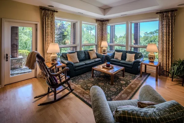 a bedroom with a bed and a night stand