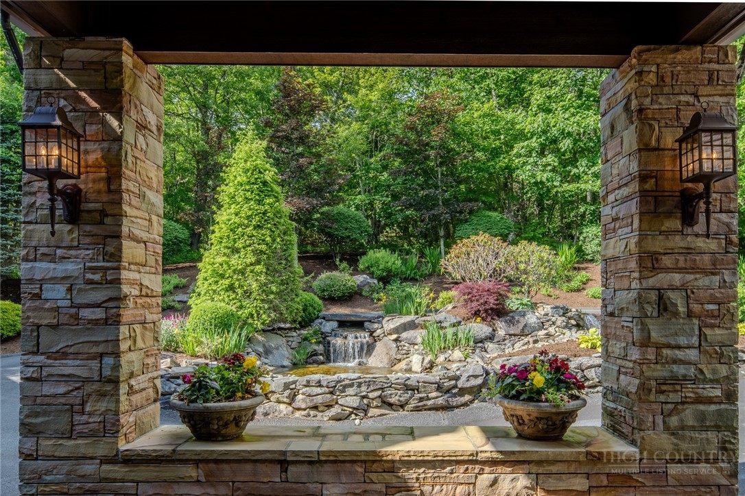331 Branch Water Run Linville, NC 28646 - Photo 5 of 50 a view of a backyard with plants
