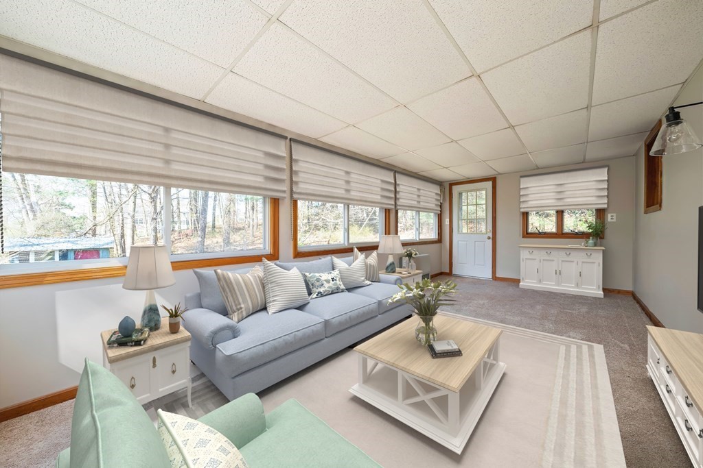 61 Orchard Road Marshfield, MA 02050 - Photo 13 of 33 a living room with furniture and a large window