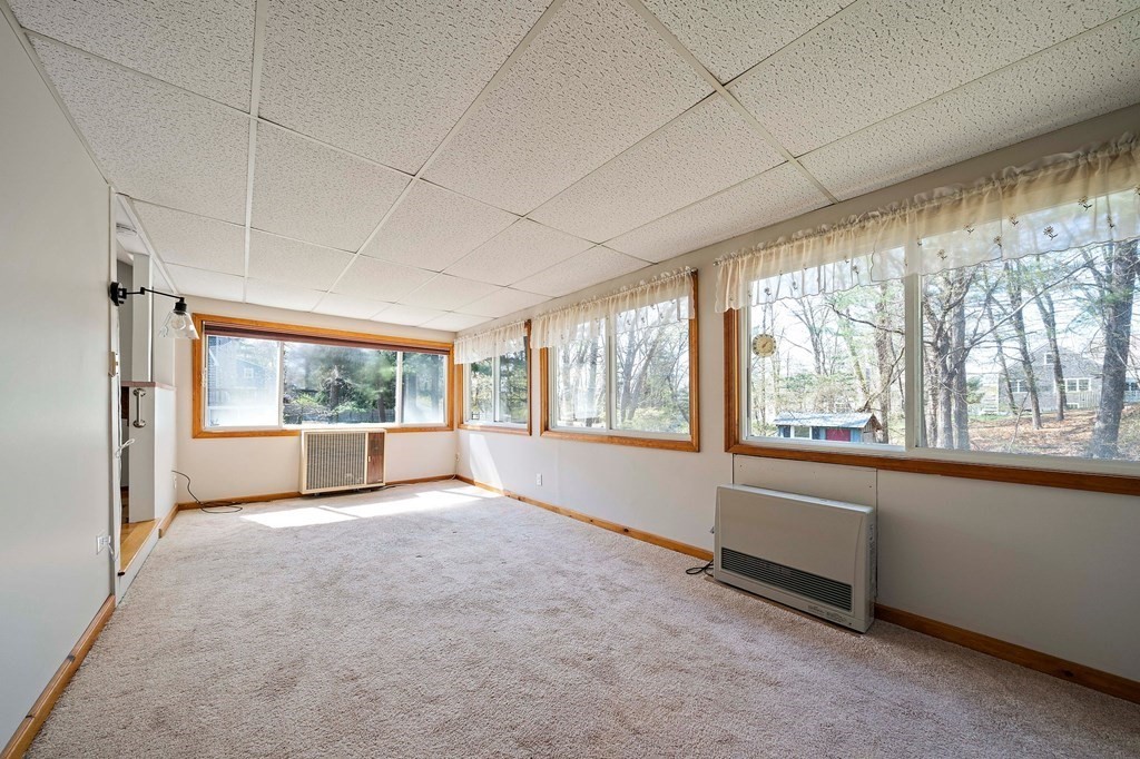 61 Orchard Road Marshfield, MA 02050 - Photo 15 of 33 a view of an empty room with a window