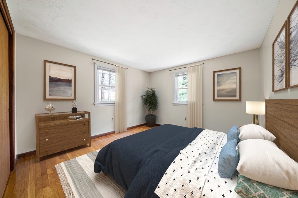 61 Orchard Road Marshfield, MA 02050 - Photo 16 of 33 a bedroom with a large bed and dresser