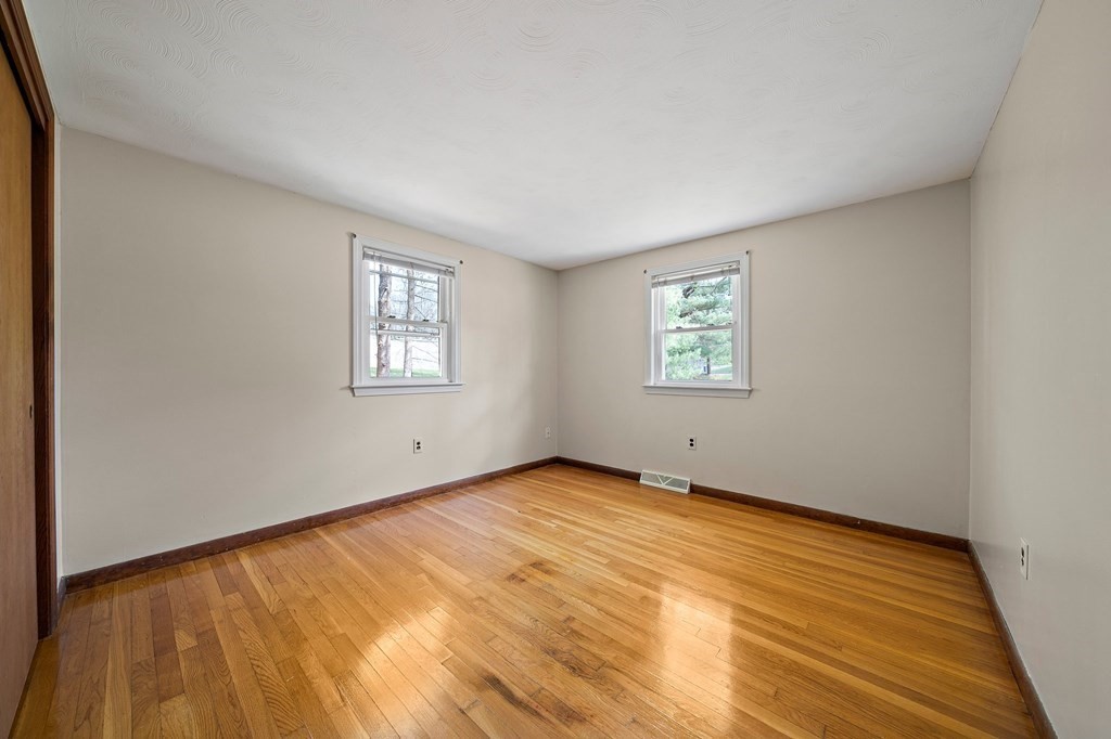61 Orchard Road Marshfield, MA 02050 - Photo 17 of 33 an empty room with windows
