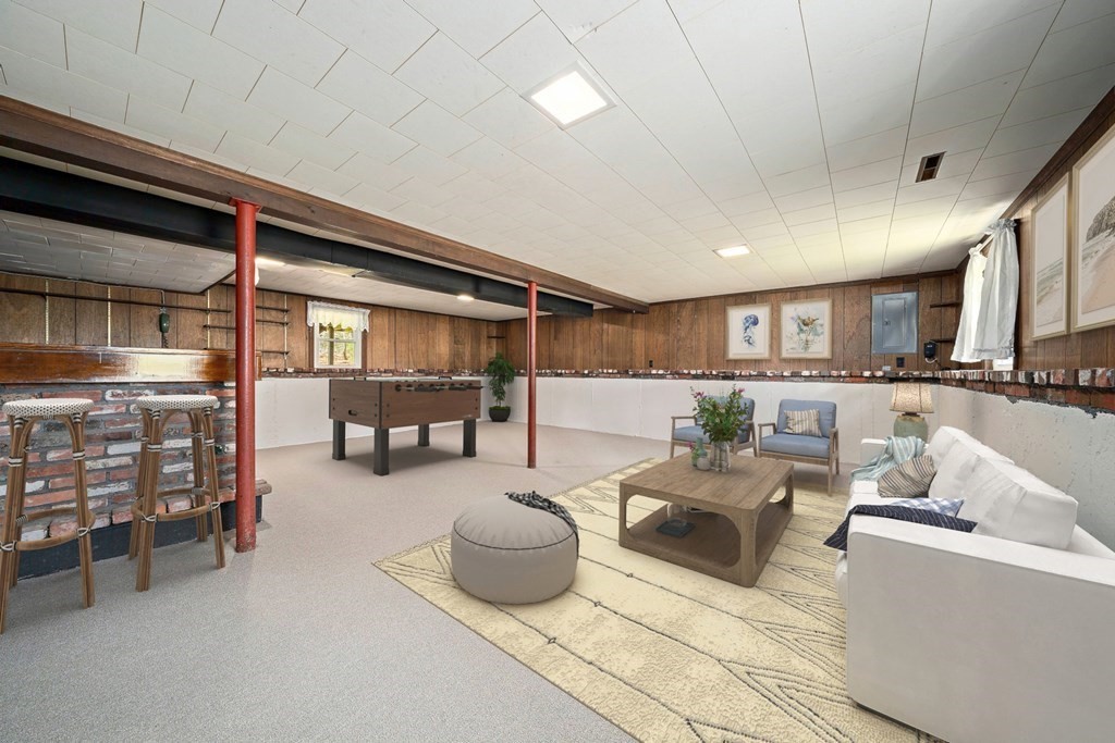 61 Orchard Road Marshfield, MA 02050 - Photo 22 of 33 a living room with furniture and a flat screen tv