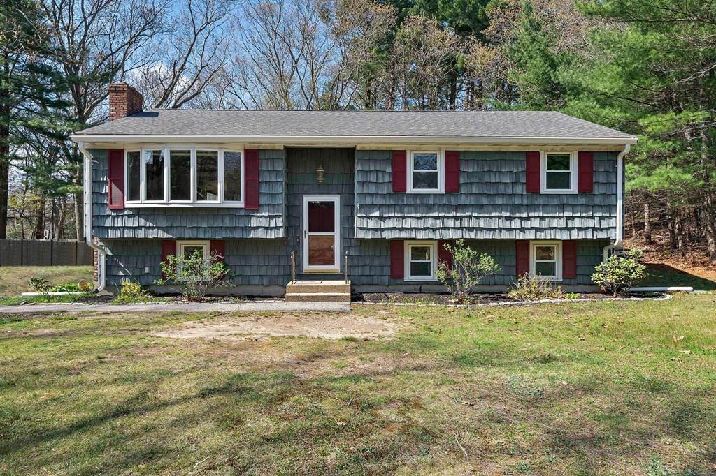 61 Orchard Road Marshfield, MA 02050 - Photo 30 of 33 a front view of a house with a yard