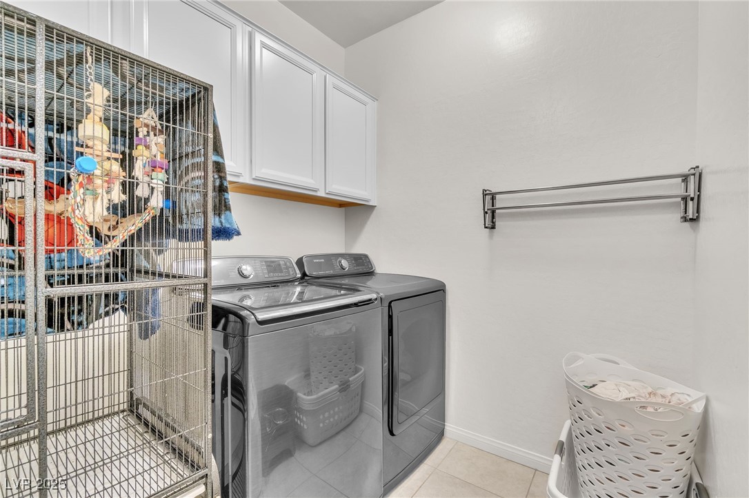 119 Mosso Niente Place Henderson, NV 89011 - Photo 25 of 36 Washroom featuring cabinet space and independent washer and dryer