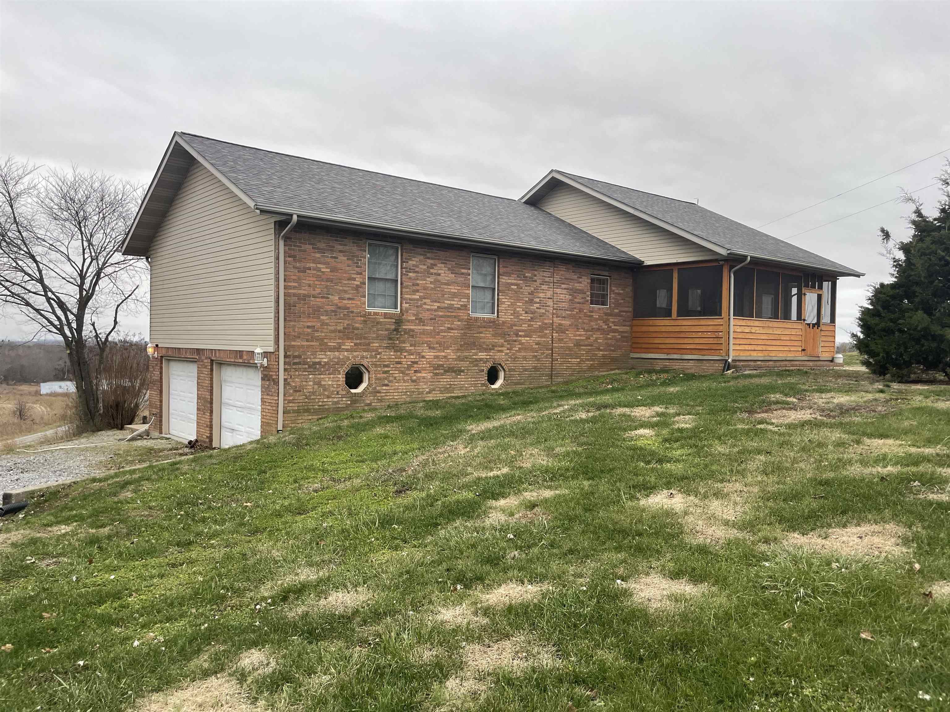 5488 Tick Ridge Road Grand Chain, IL 62941 - Photo 1 of 27 a front view of house with yard