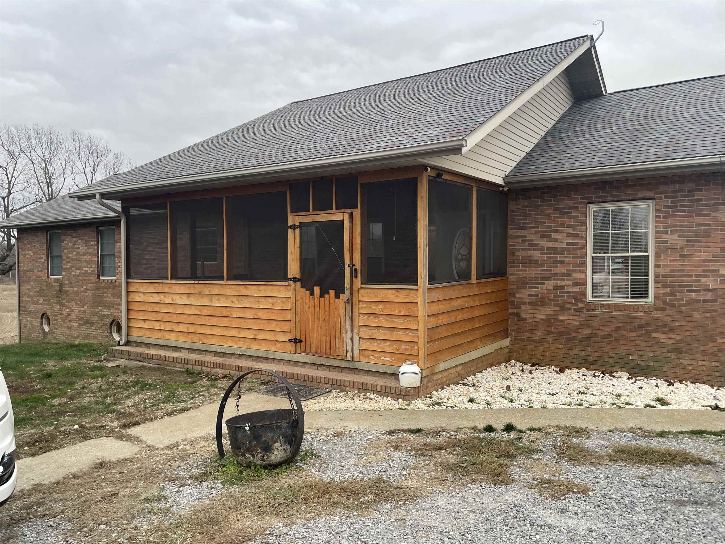 5488 Tick Ridge Road Grand Chain, IL 62941 - Photo 2 of 27 a front view of a house with a yard