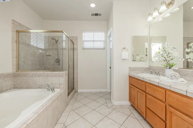 a view of a bathroom from a hallway