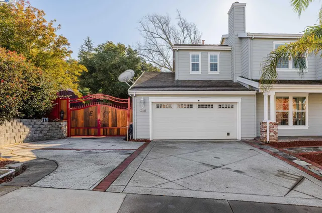 a front view of a house with a garage