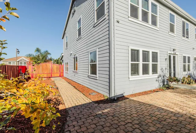 a front view of a house with patio