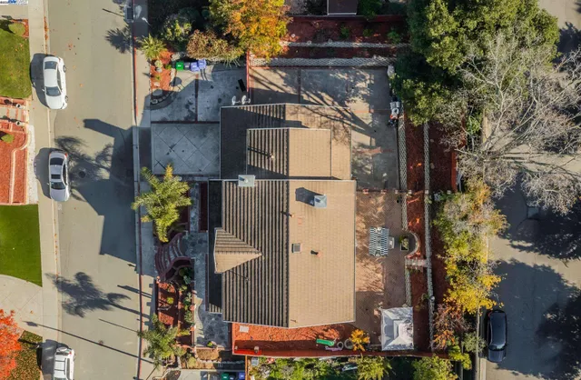 an aerial view of a house with outdoor space