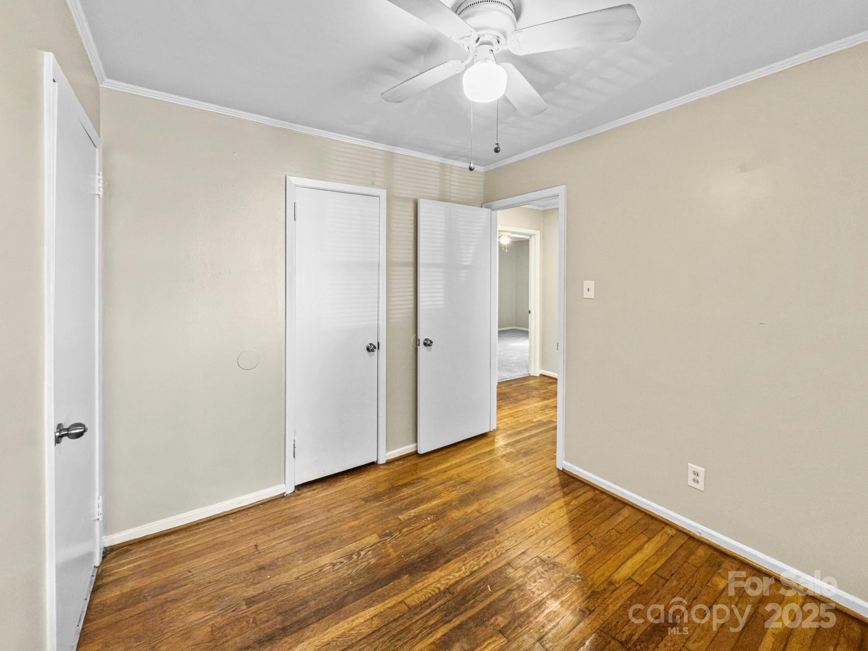 3014 Marlborough Road Charlotte, NC 28208 - Photo 11 of 20 a view of an empty room with wooden floor