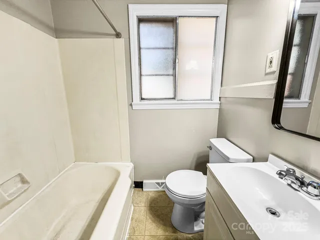 a bathroom with a sink and a bathtub
