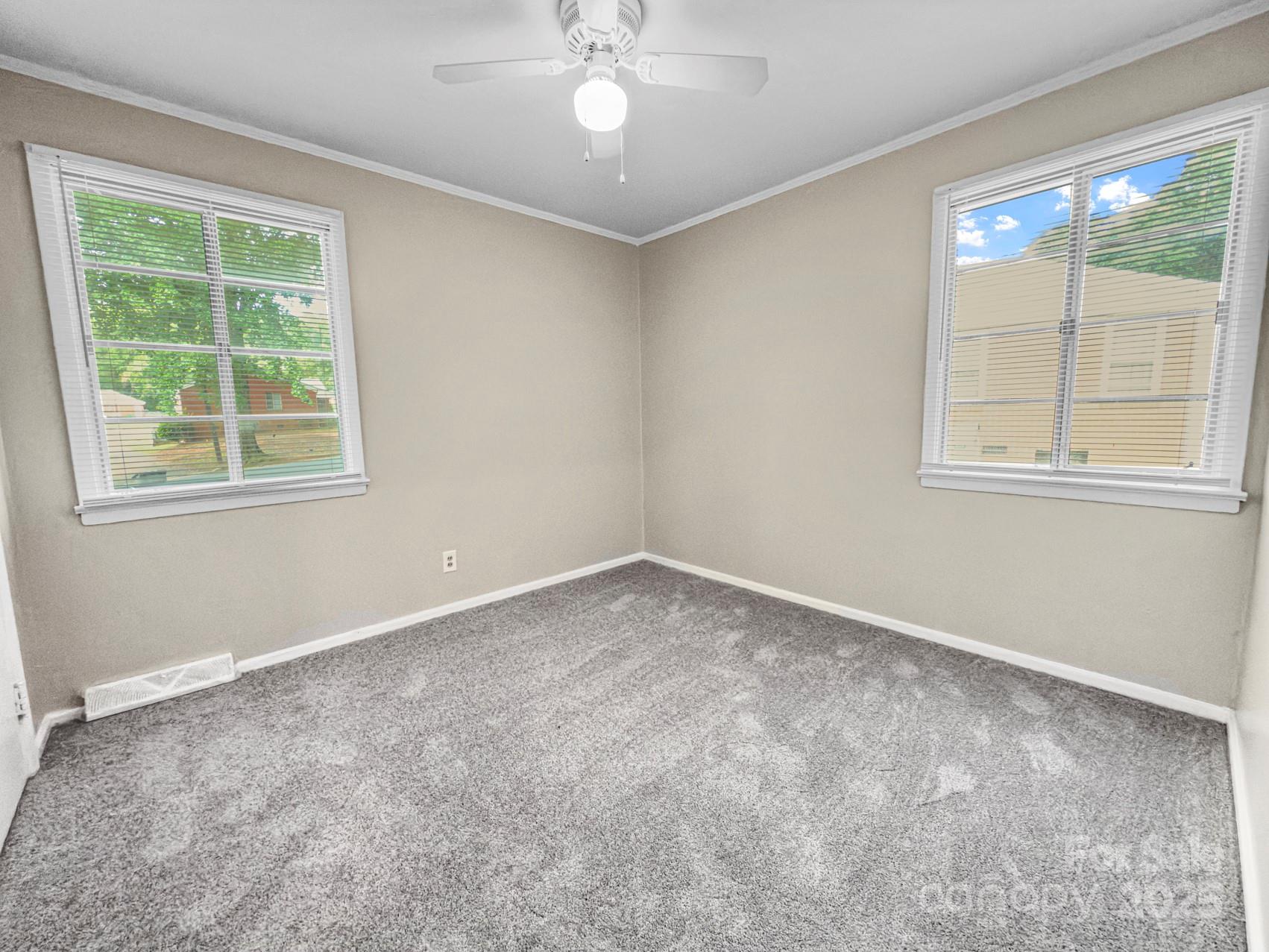 3014 Marlborough Road Charlotte, NC 28208 - Photo 8 of 20 an empty room with a window