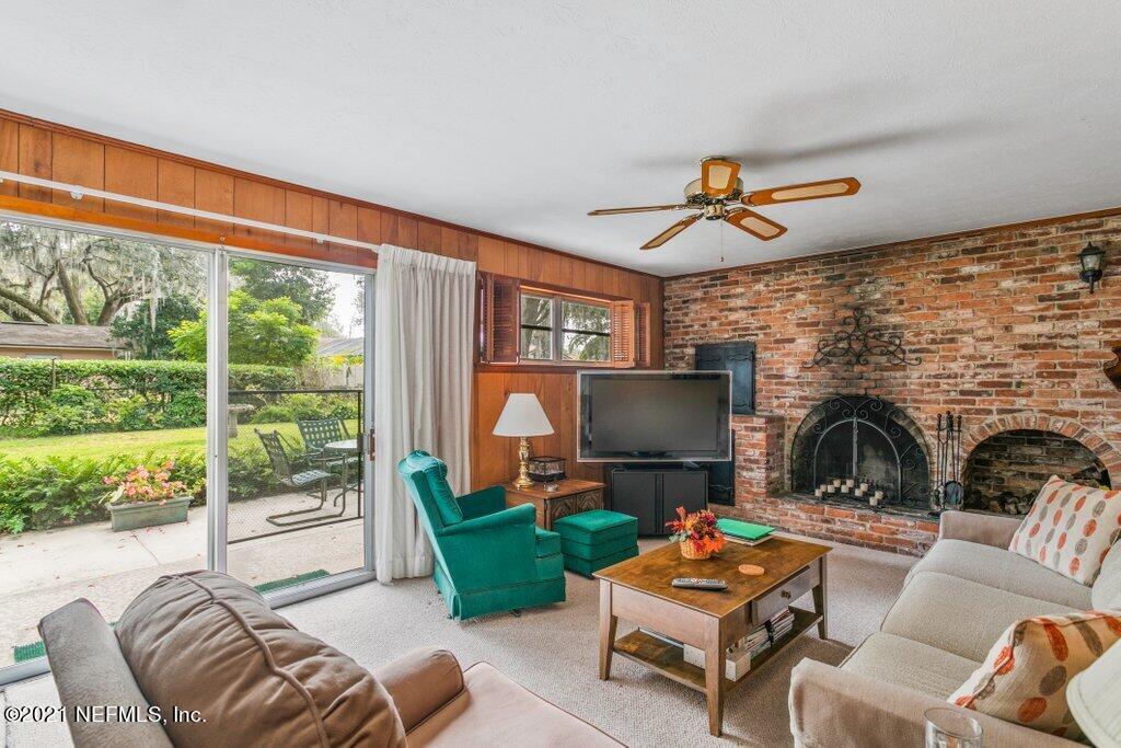 5434 Sanders Road Jacksonville, FL 32277 - Photo 12 of 31 Ground Floor Bonus Room with Fireplace