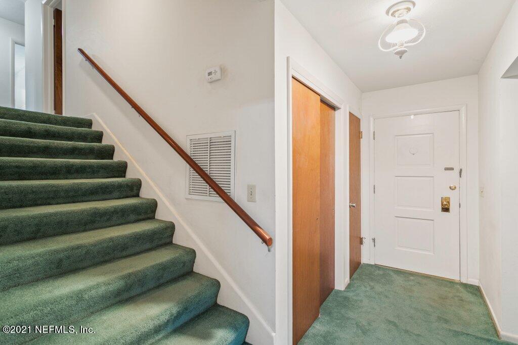 5434 Sanders Road Jacksonville, FL 32277 - Photo 25 of 31 Front Door, Stairs Leading to Bedrooms