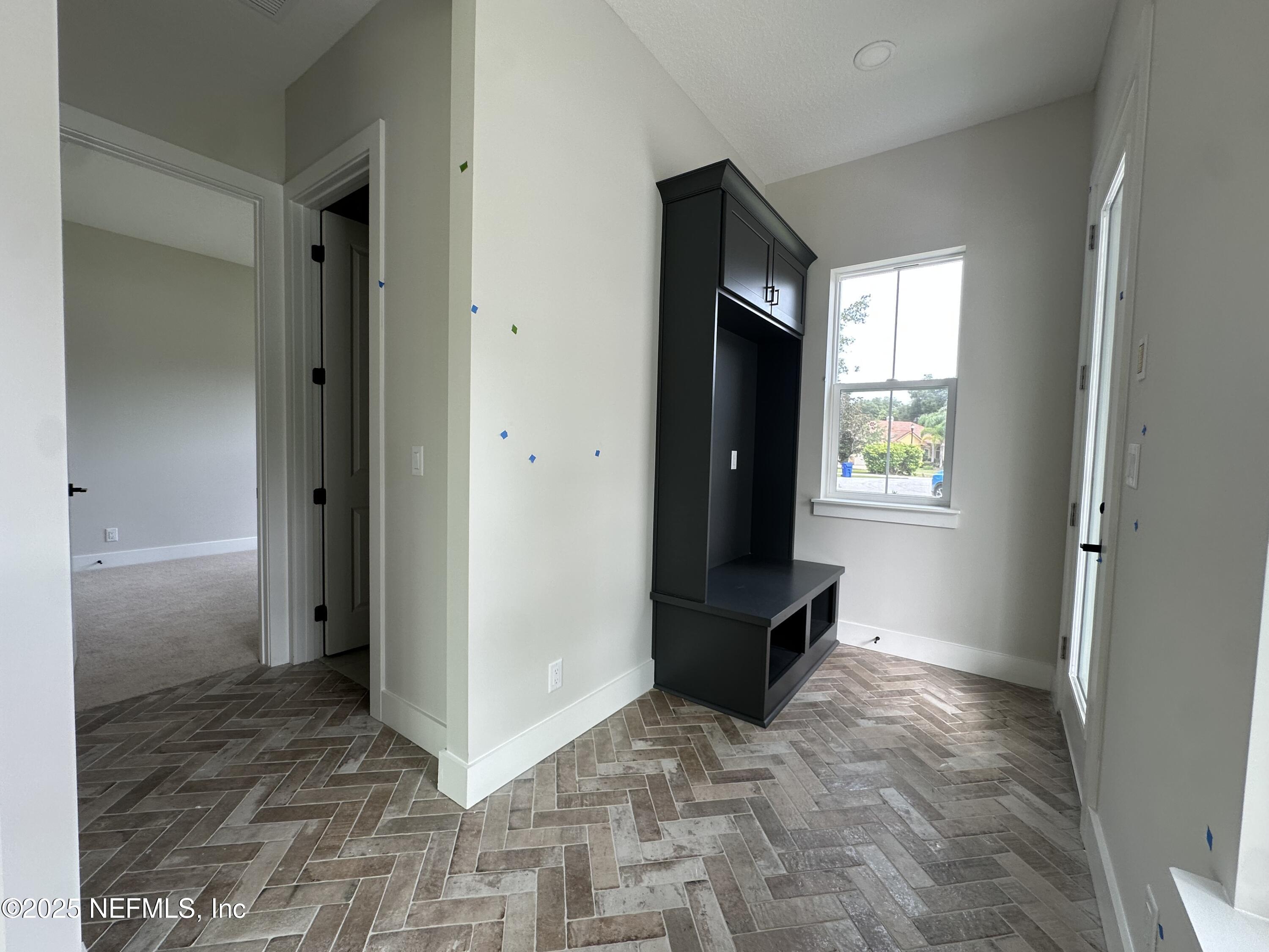 809 Brandywine Court St. Augustine, FL 32086 - Photo 20 of 63 a view of entryway with window and hallway