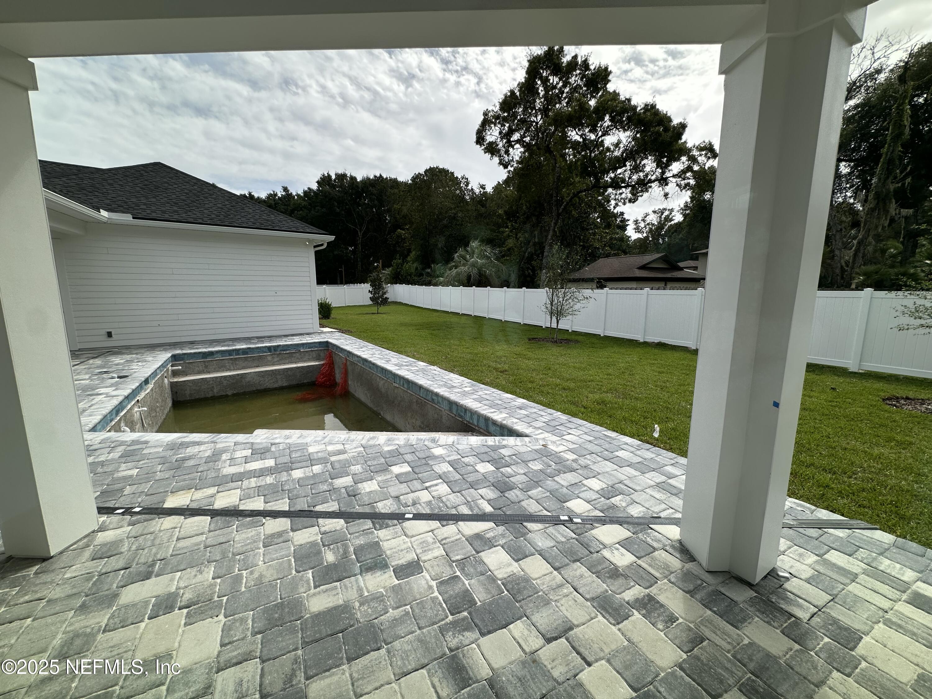 809 Brandywine Court St. Augustine, FL 32086 - Photo 34 of 63 a view of swimming pool with a yard