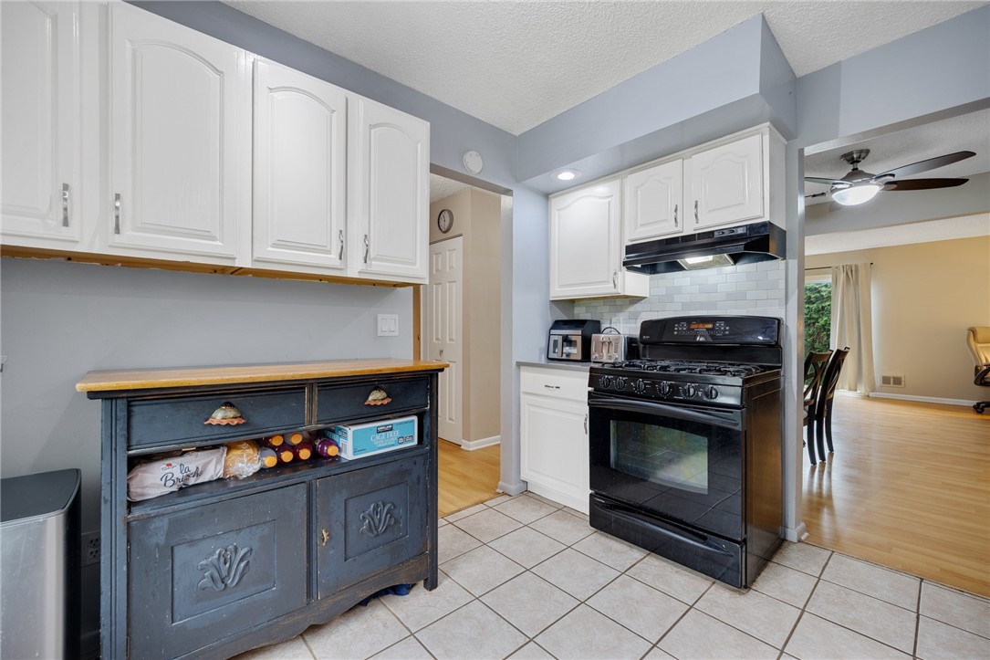 597 French Road Brighton, NY 14618 - Photo 4 of 24 Kitchen features loads of cabinet space.