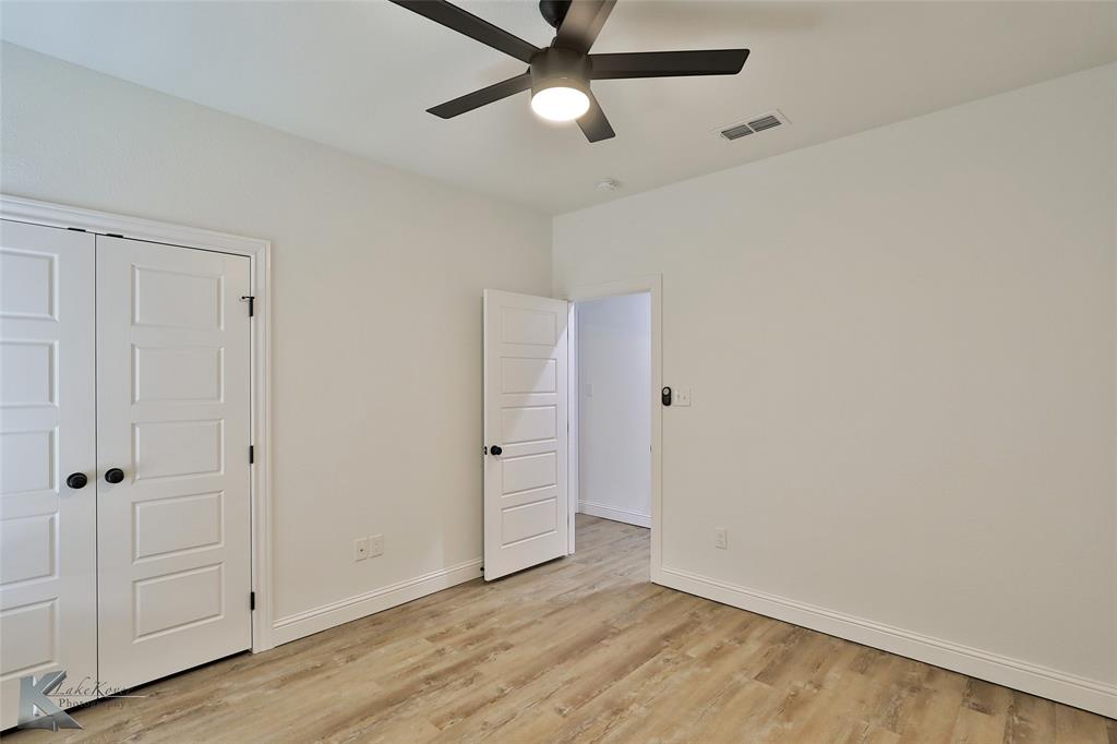 243 Beechcraft Abilene, TX 79602 - Photo 24 of 33 wooden floor in an empty room