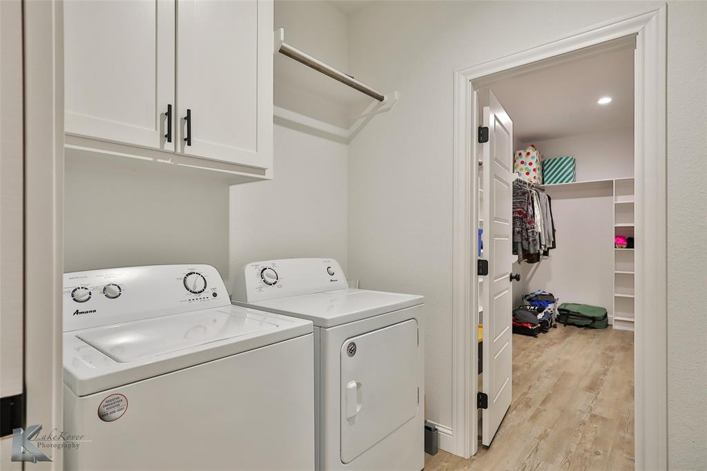 243 Beechcraft Abilene, TX 79602 - Photo 26 of 33 a view of storage and utility room with washer and dryer