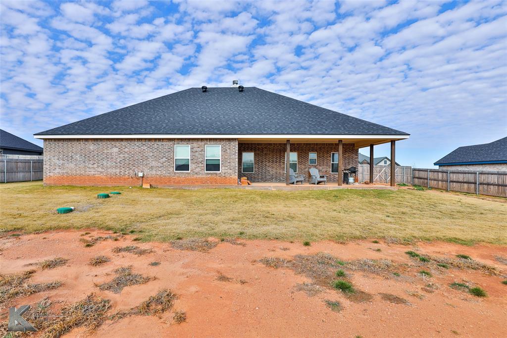243 Beechcraft Abilene, TX 79602 - Photo 31 of 33 a view of swimming pool next to a brick building