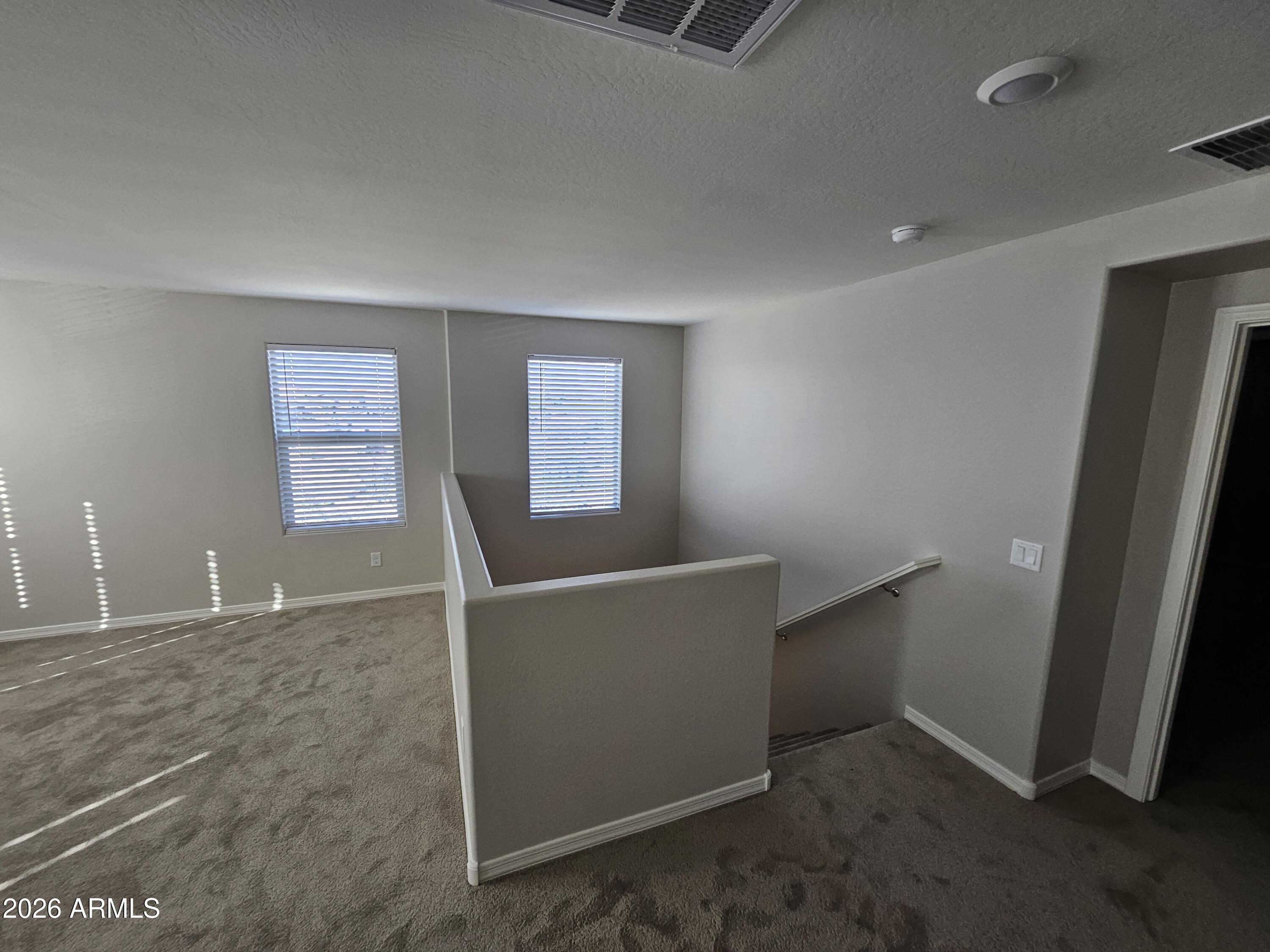 3010 East Augusta Avenue Gilbert, AZ 85298 - Photo 16 of 33 an empty room with windows